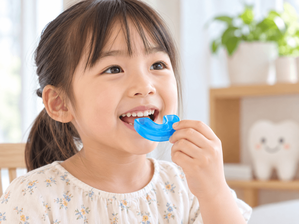 プレオルソを手にした女の子の写真